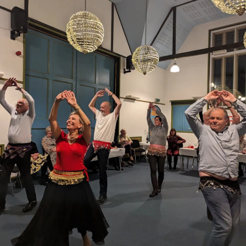 People dancing in a hall